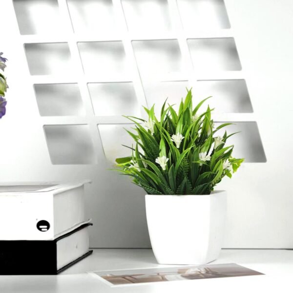 bf431de4-af7b-4537-b980-49c7ec50e4a4.0a0664a709f5ce553efa58d63cc66042_converted.jpg Small Artificial Potted Plant with Flowers – Green